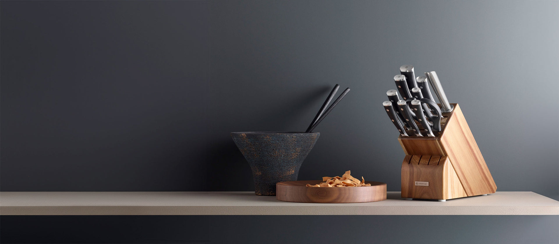 block of knives sitting on a table
