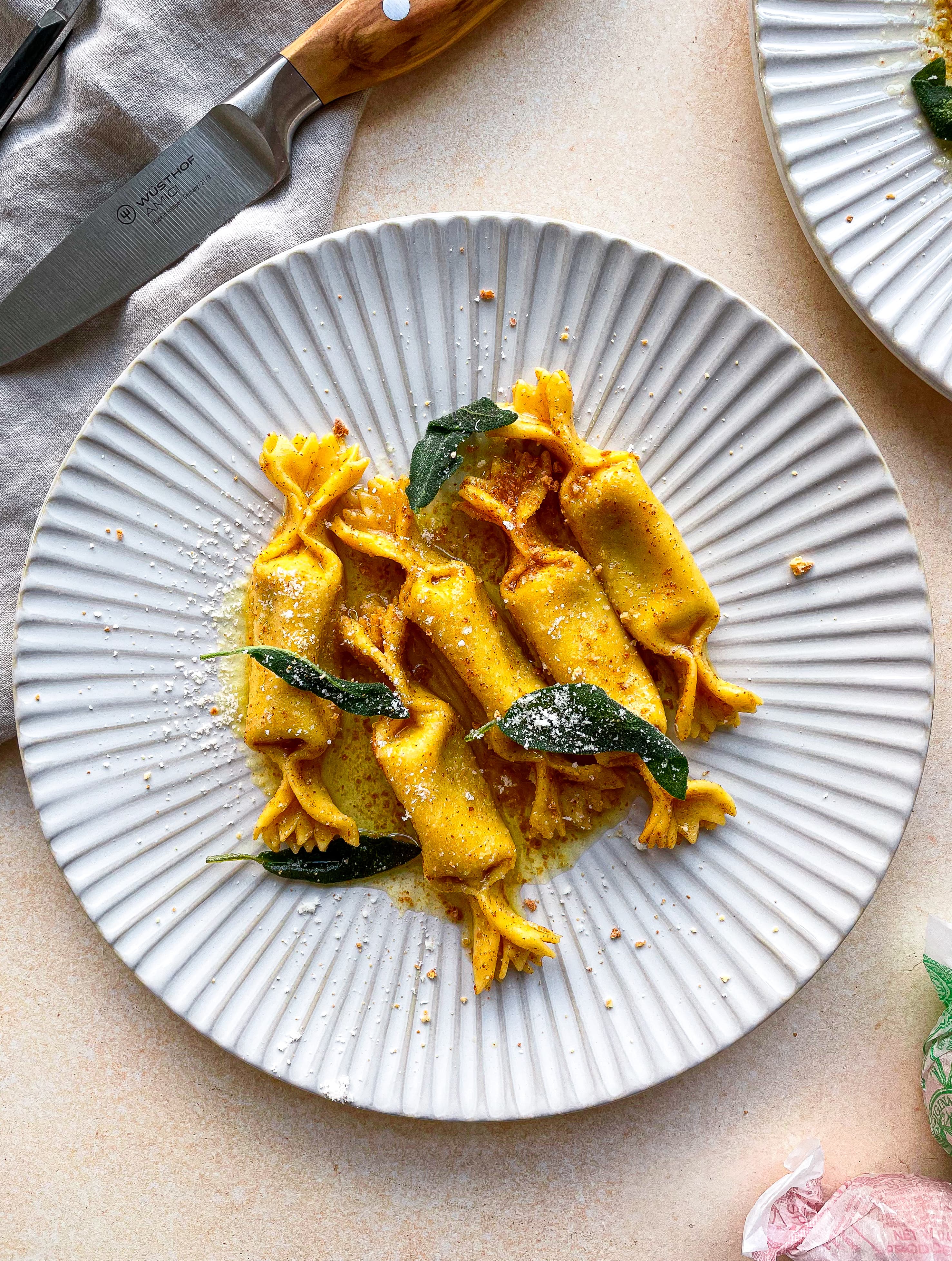 Plated dish of pumpkin & amaretti caramelle