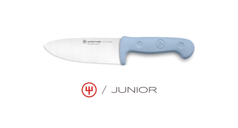 A kitchen knife with a blue handle and a silver blade, labeled "Wüsthof Junior," is displayed against a white background.