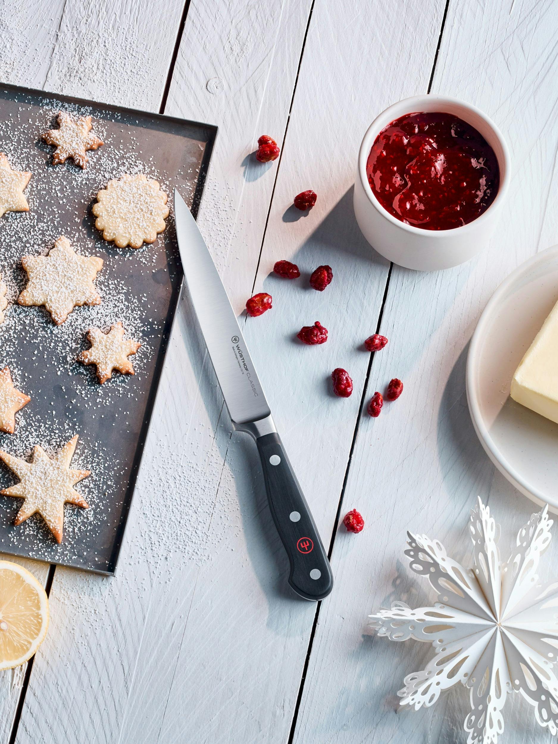 Classic knife with snowflake and sugar cookies