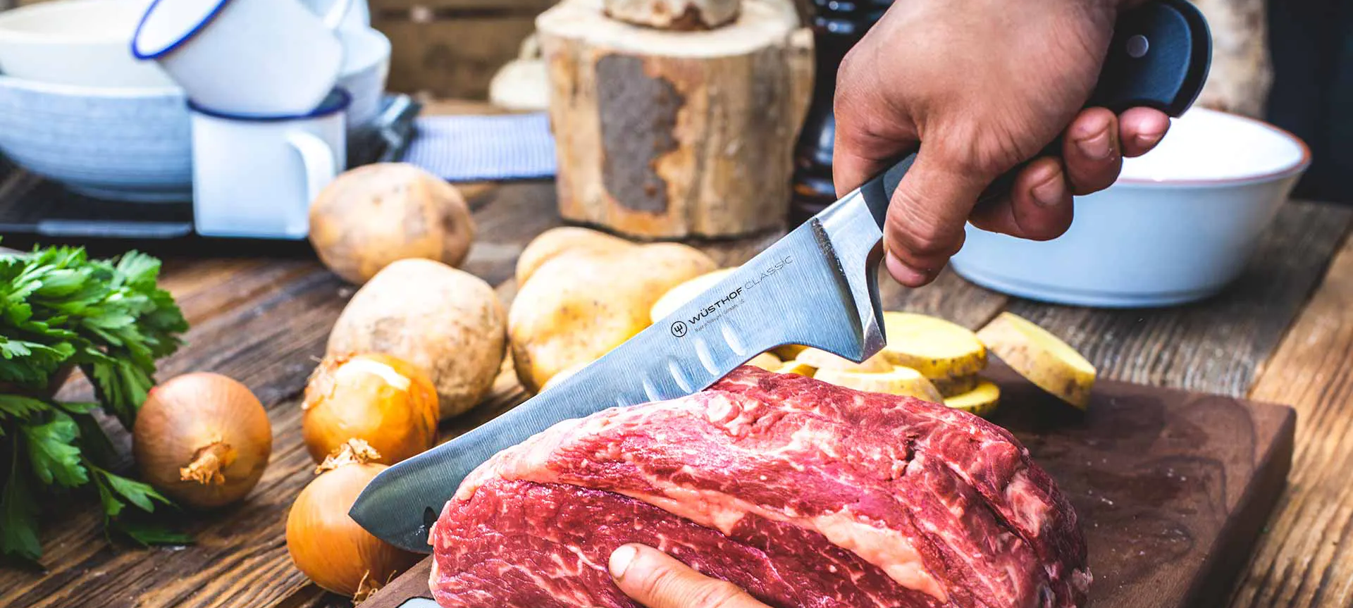 WUSTHOF Butcher Knife cutting beef roast