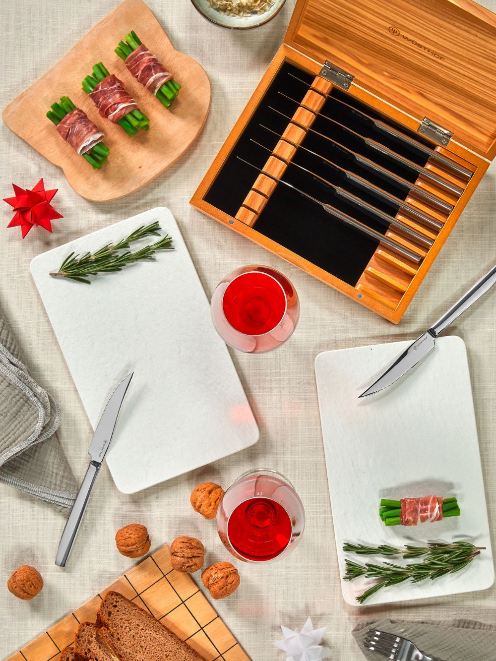 Wooden knife set with food items on a table