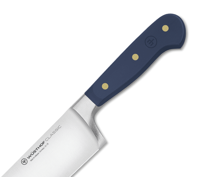A Wusthof Classic knife handle in the Wild Blueberry